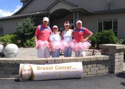 Four Fore for Shan golfers wearing pink tutus