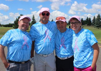 Four Fore for Shan golfers in breast cancer awareness shirts